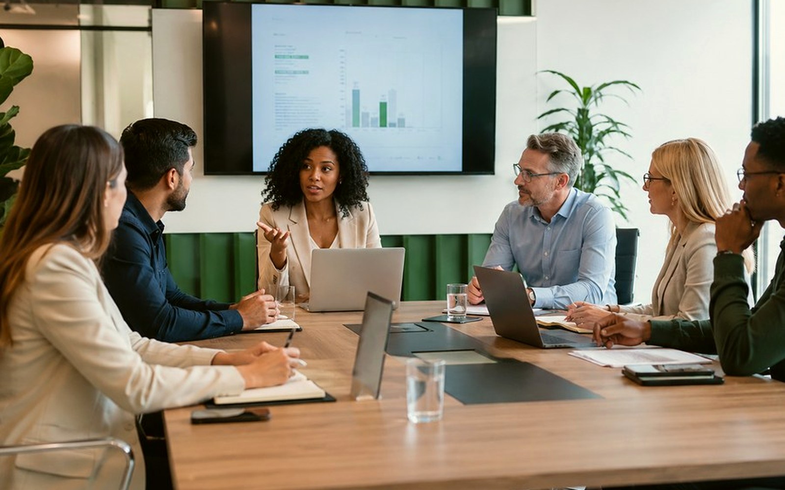 Business meeting around a boardroom table