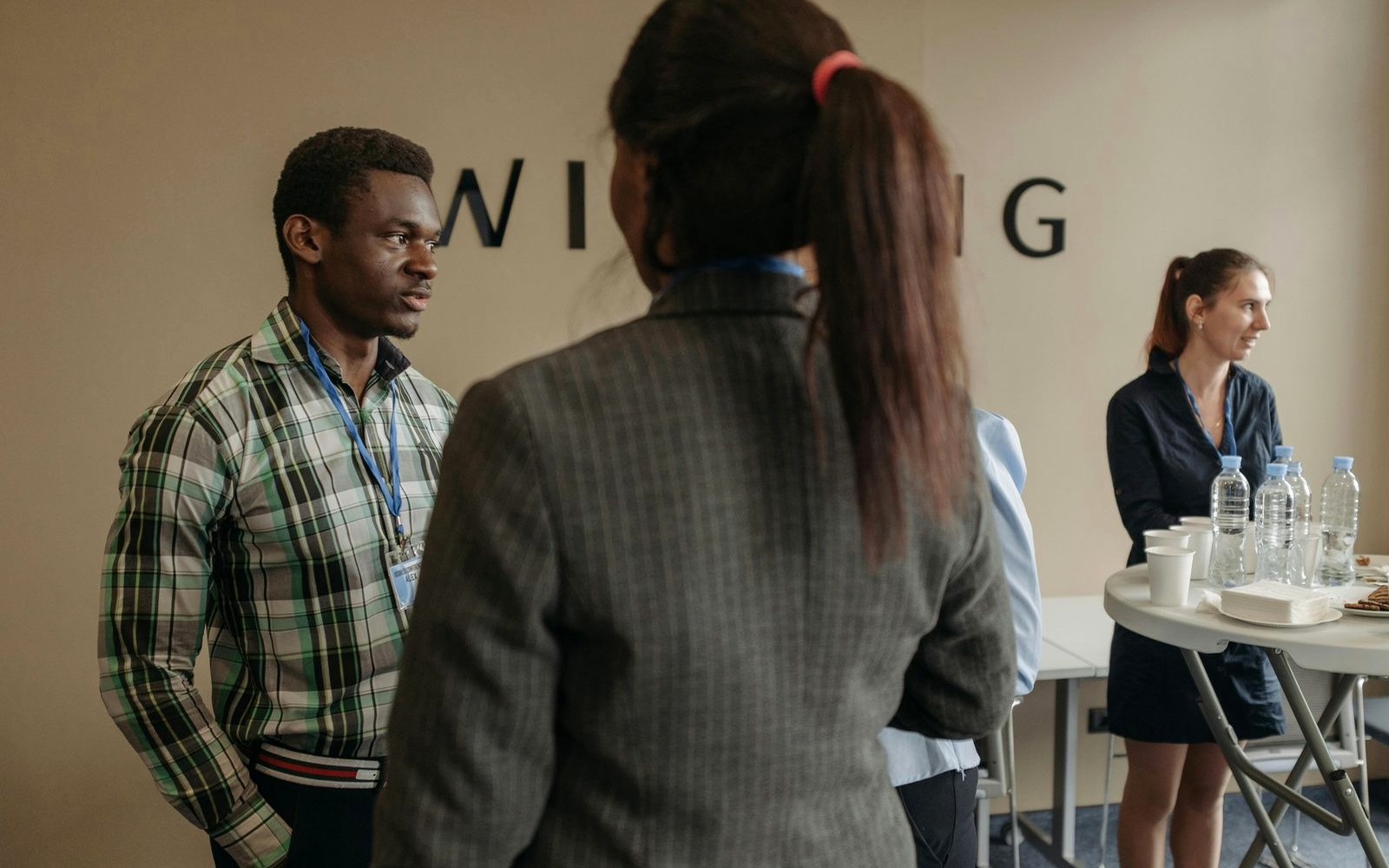 Professionals networking during an event